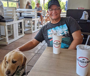 Dr. Romney with his dog Benson