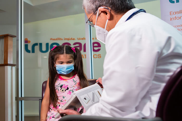 Dr. Posadas conducting an assessment Dr. Posadas conducting an assessment