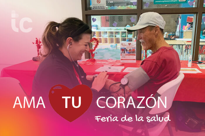 truecare-events-love-your-heart-health-fair-2024-blog-700×466-spanish (2) TrueCare Love Your Heart Health Fair. Woman taking man's blood pressure