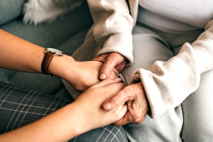 truecare-featured-image-blog-self-care-for-caregivers-700×466 Women holding hands
