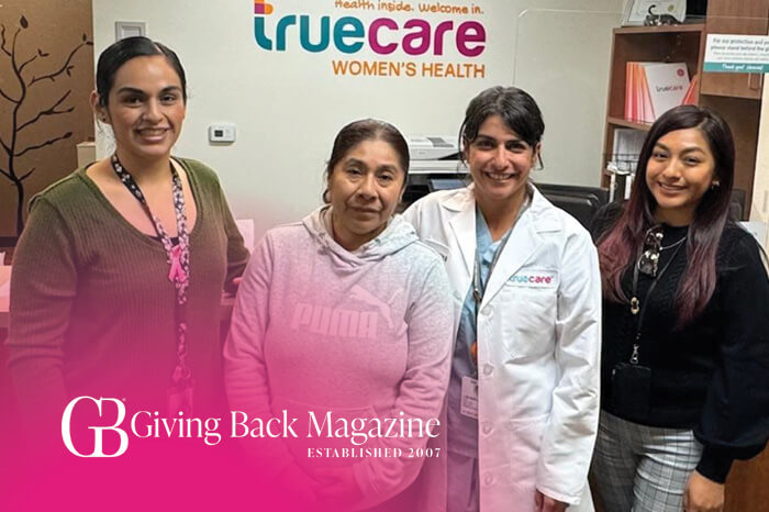 truecare-news-giving-back-magazine-mostofian-featured-image-blog-700×466 Dr. Mostofian with women's health patient and staff.